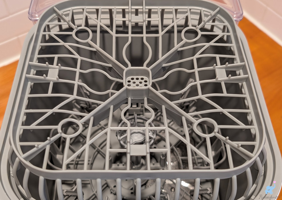 the upper rack of the momcozy bottle washer